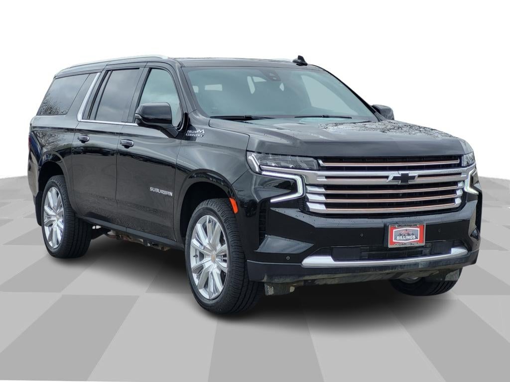 2022 Chevrolet Suburban High Country in Black — front three-quarter view