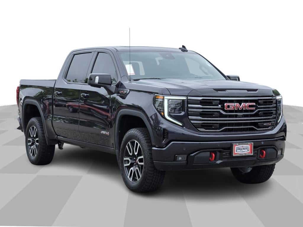 2025 GMC Sierra 1500 AT4 in Titanium Rush Metallic — front three-quarter view